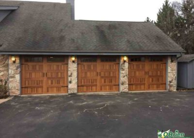 Cedar doors on three-car garage.